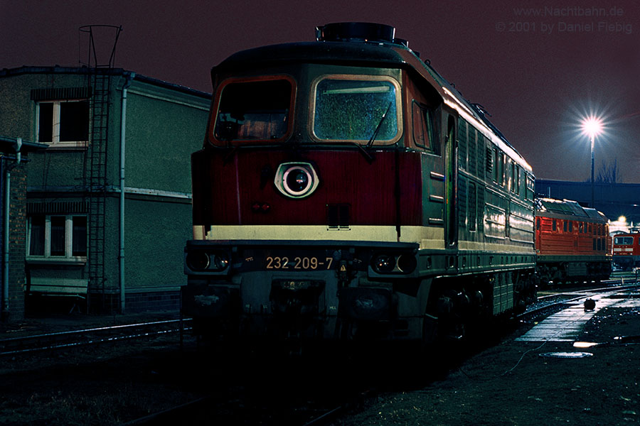 232 209